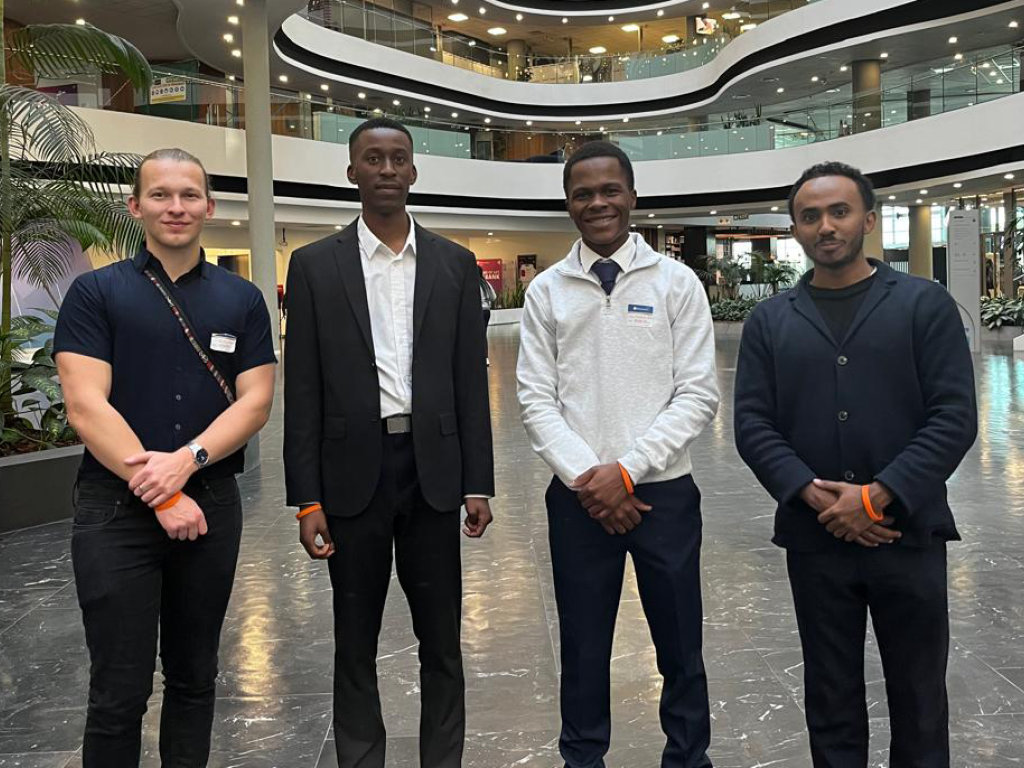 THE COOKOUT (Discovery GradHack 2024 Winners!) Left: Ben Cleveland - BSc Computer Science & Applied Statistics - Honours in Computer Science; Middle-left: Jordy Kafwe - BSc Computer Science & Business Computing - Honours in Computer Science; Middle-right: Maesela Katlego Sekoele - BSc Computer Science & Business Computing - Honours in Information Systems; and Right: Yohannes Gebremeskel Libelo - BSocSci Informatics & Sociology - Honours in Information Systems